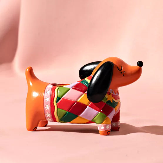Mäyräkoira kynttilänjalka