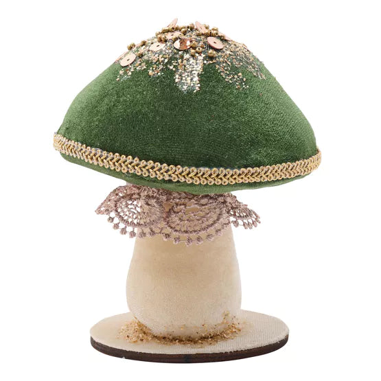Samettinen vihreä sienikoriste alustalla